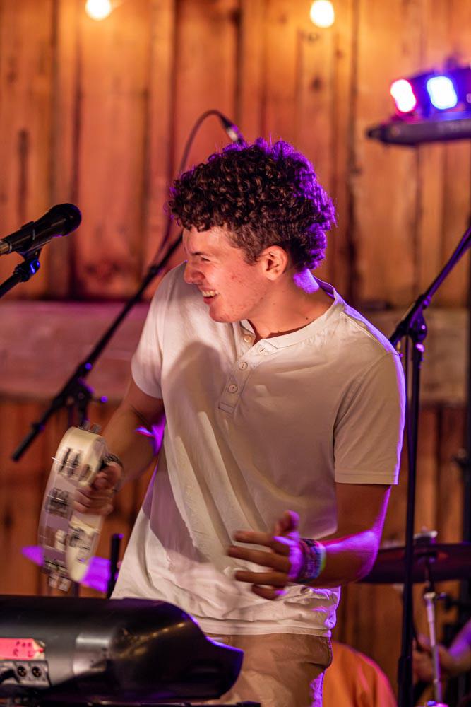 Musician playing tambourine